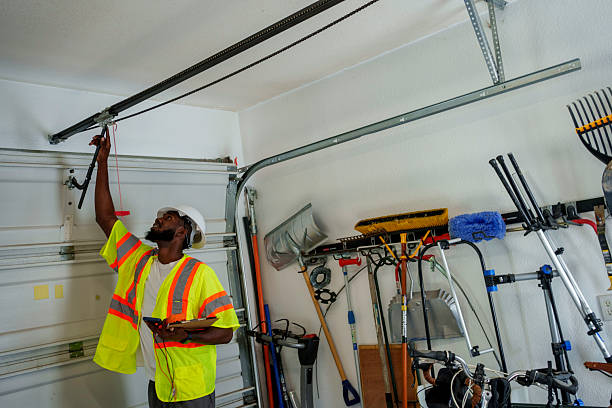 Professional Garage Door technician working in St. Elmo, IL